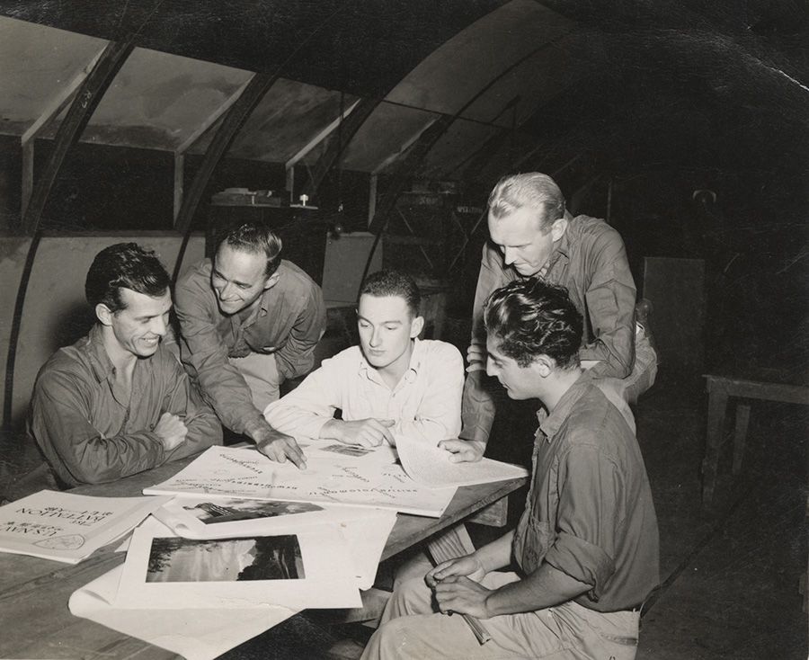 Edwin Keegan, Natale Bellantoni, and others working on the Battalion Log, no date.