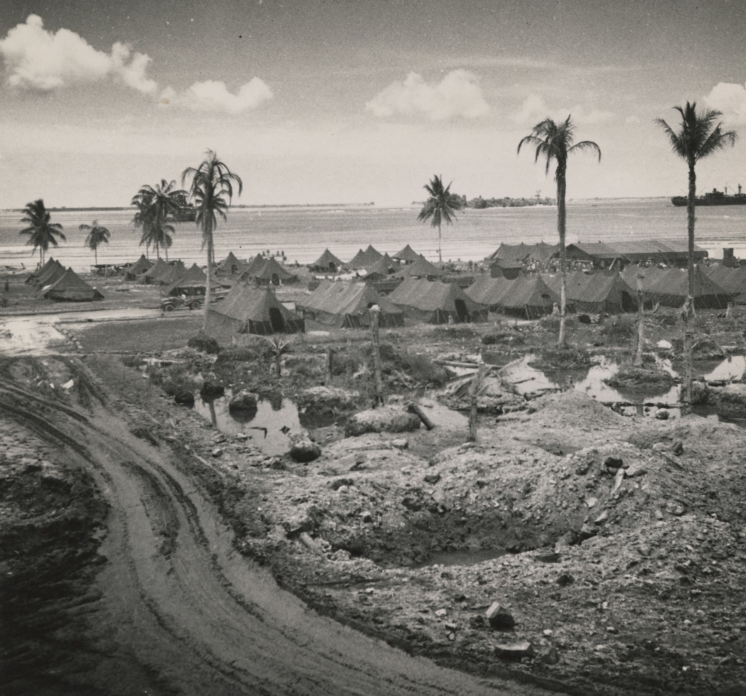 Tent city in Lorengau, New Guinea, no date. This tent city in Lorengau was where the 78th Construction Battalion lived while they built the Naval Air Base Receiving Station on Manus Island.