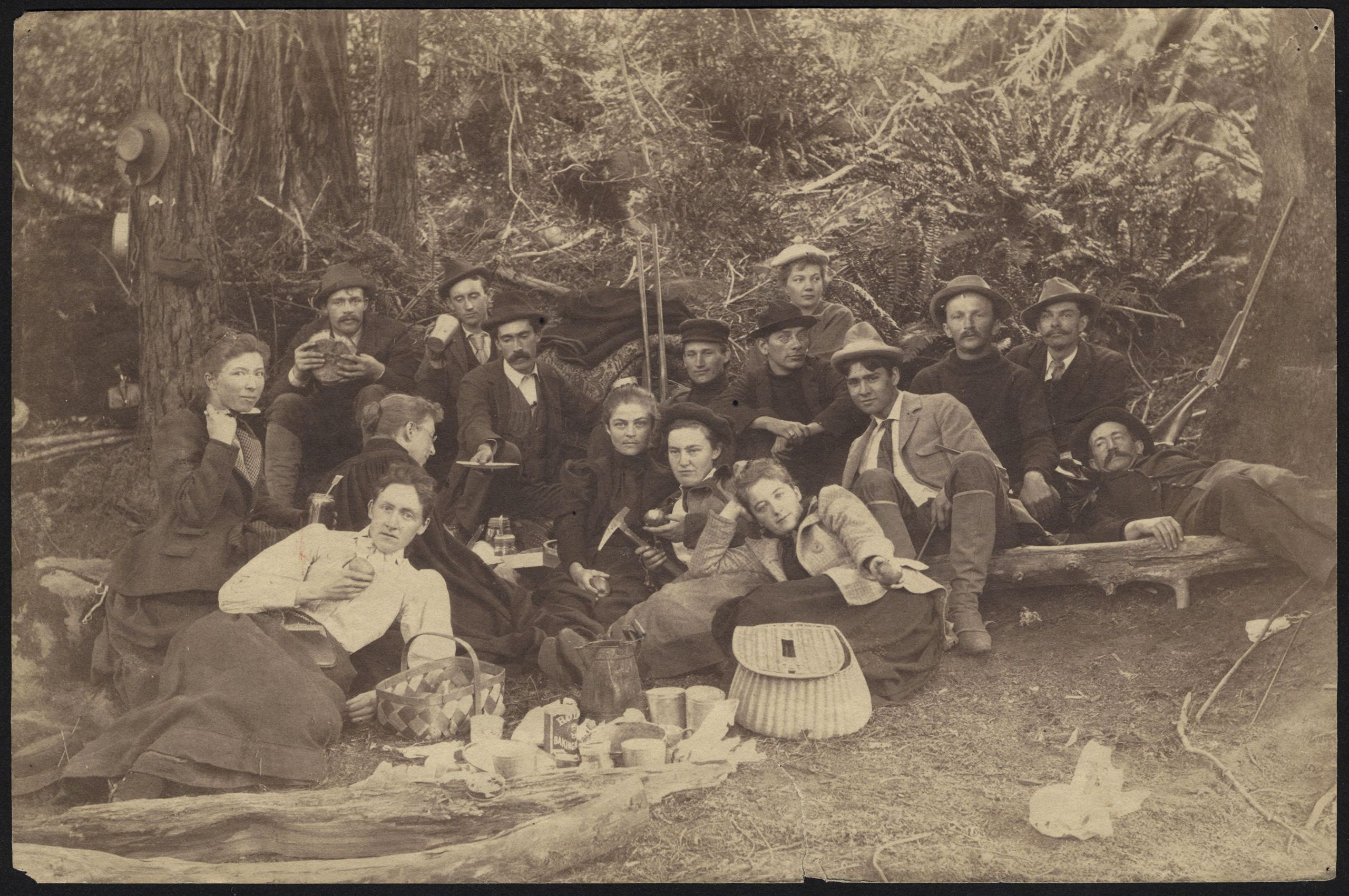Photograph of Lou Henry Hoover (seated, center holding apple and pickaxe) and the Stanford Zoology Club,  1898.  Courtesy of Stanford University Libraries.