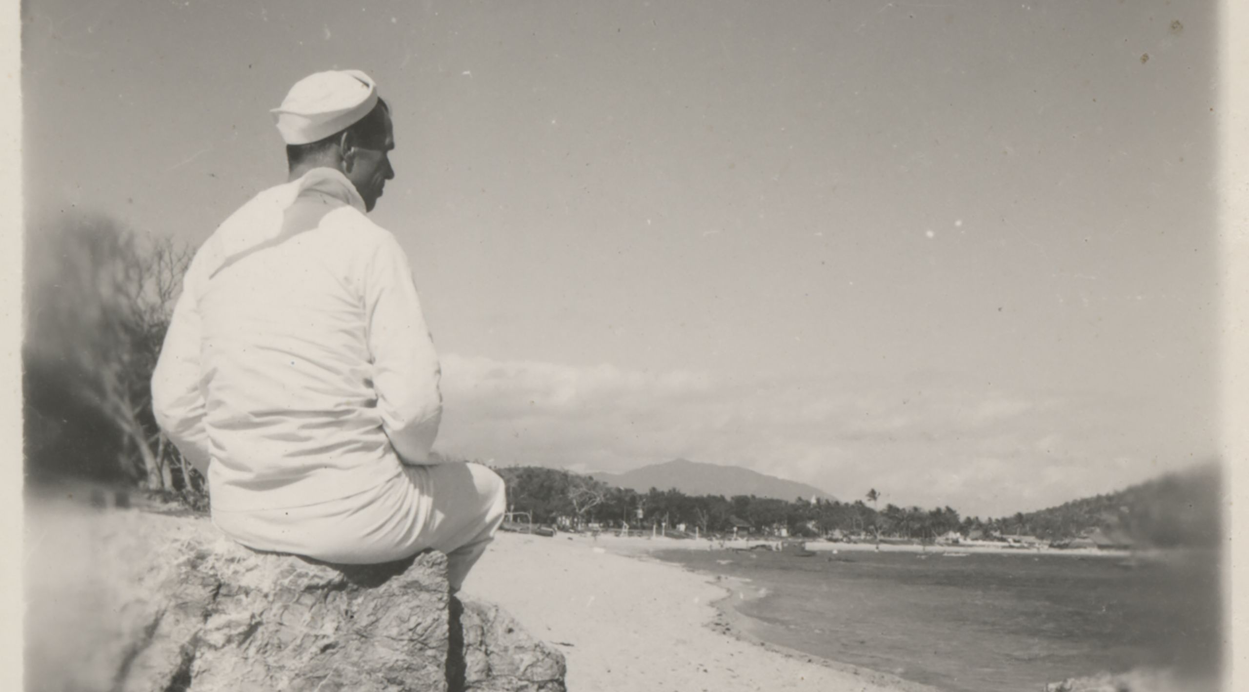 Black and white photograph of Ed Keegan at Anse Vata beach, New Caledonia, 1943–1945. 