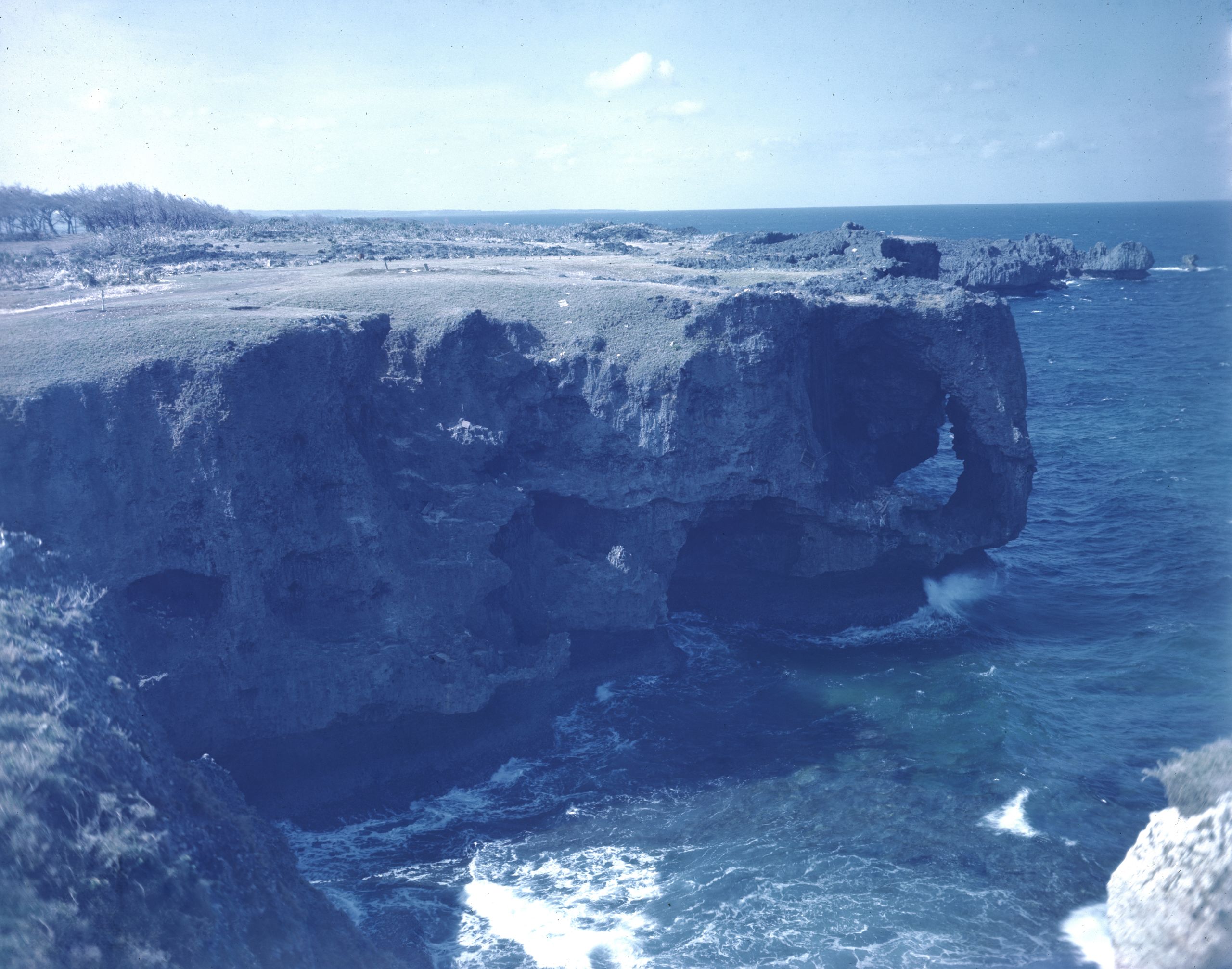 Color photograph of the craggy Okinawan coast, 1945.